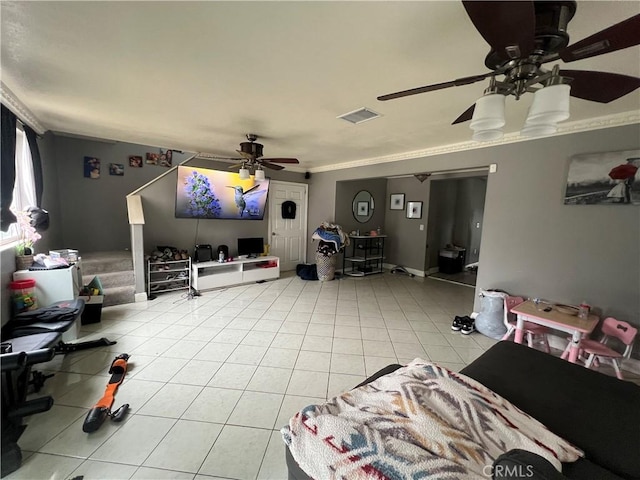 664 W 14th St, San Bernardino, CA 92405 - living area featuring ornamental molding, visible vents, ceiling fan, and light tile patterned flooring