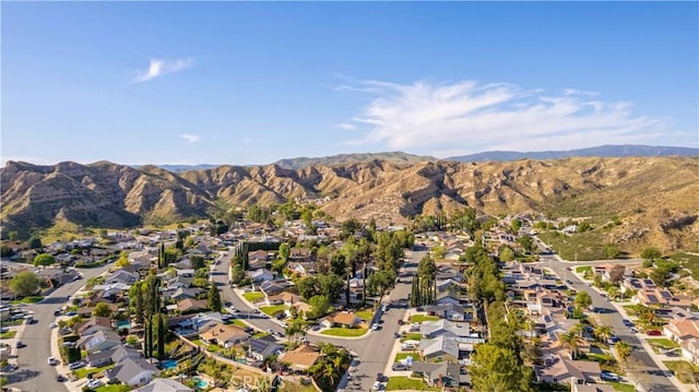 bird's eye view featuring a mountain view and a residential view