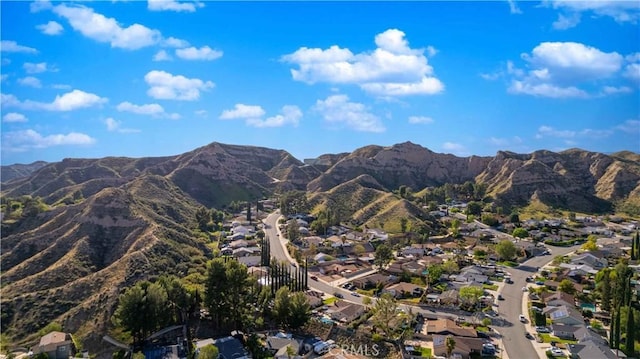 drone / aerial view with a mountain view and a residential view