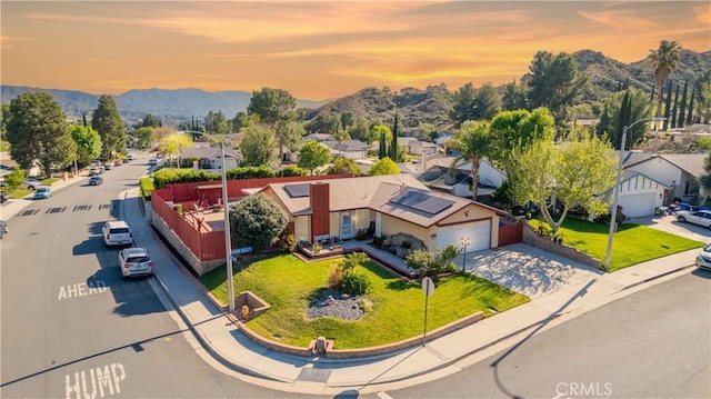 bird's eye view with a mountain view and a residential view
