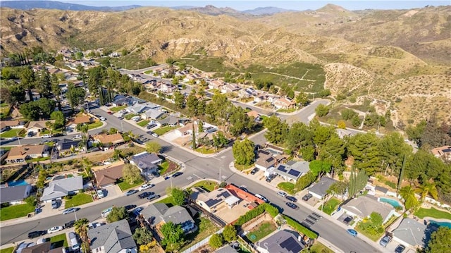 aerial view featuring a mountain view and a residential view