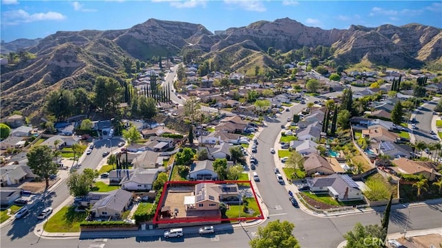 aerial view featuring a mountain view and a residential view