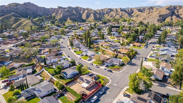 drone / aerial view featuring a mountain view and a residential view