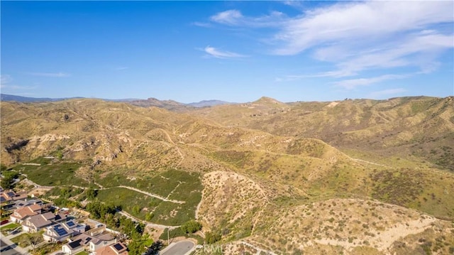drone / aerial view featuring a mountain view