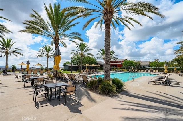pool featuring a patio area