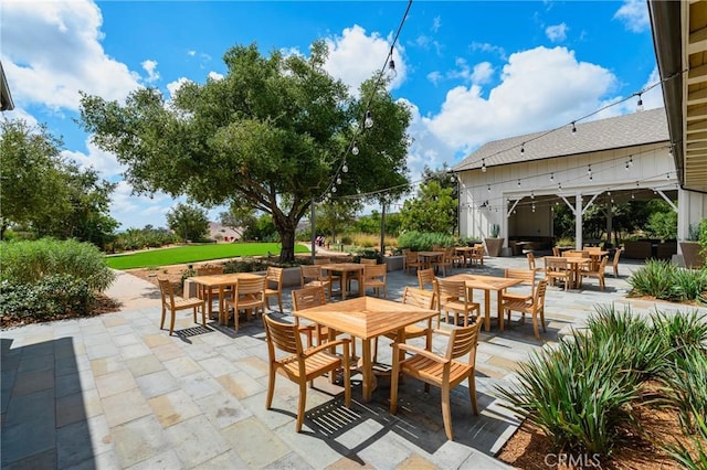 view of patio featuring outdoor dining space