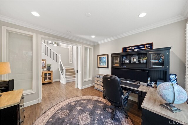 home office featuring baseboards, ornamental molding, recessed lighting, and wood finished floors