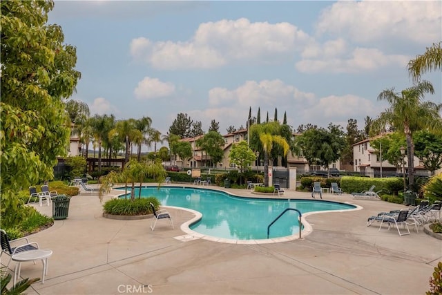 pool with a patio area