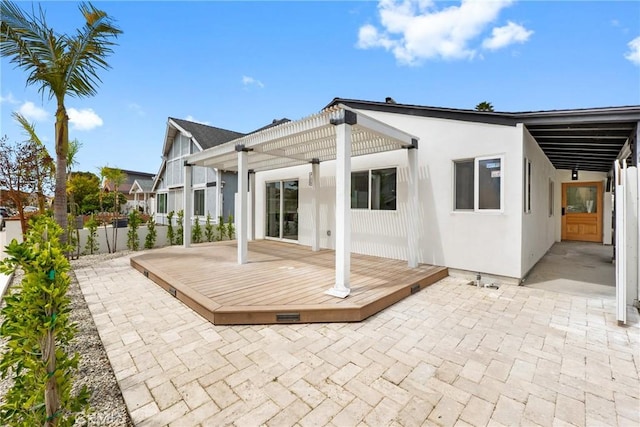 5121 Beachcomber St, Oxnard, CA 93035 - back of property with a pergola, a deck, fence, stucco siding, and a patio area
