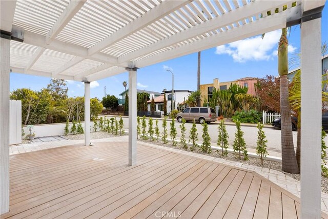deck featuring a pergola