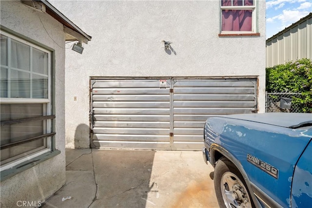 2610 Niles St, Bakersfield, CA 93306 - garage featuring driveway and fence