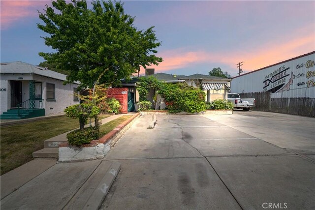 2610 Niles St, Bakersfield, CA 93306 - view of front of house with a front lawn