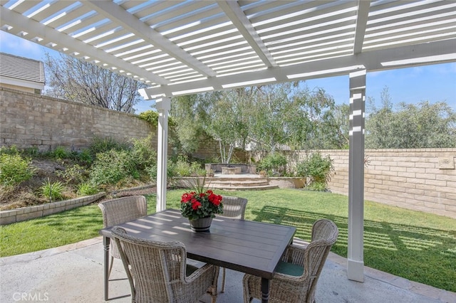 view of patio / terrace featuring a fenced backyard, outdoor dining space, and a pergola