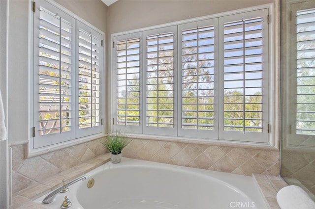 full bathroom with a garden tub