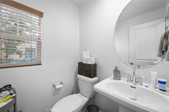 bathroom with a sink and toilet