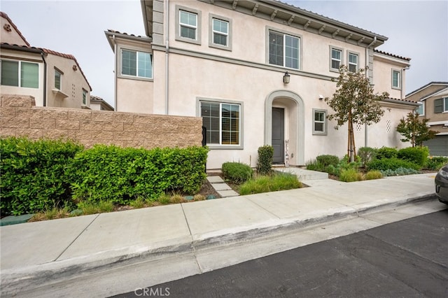 view of front of house featuring stucco siding