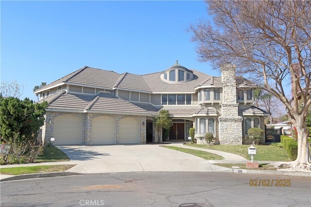 519 Connie Rae Way, Arcadia, CA 91006 - view of front of home with stone siding, a garage, driveway, and a tile roof
