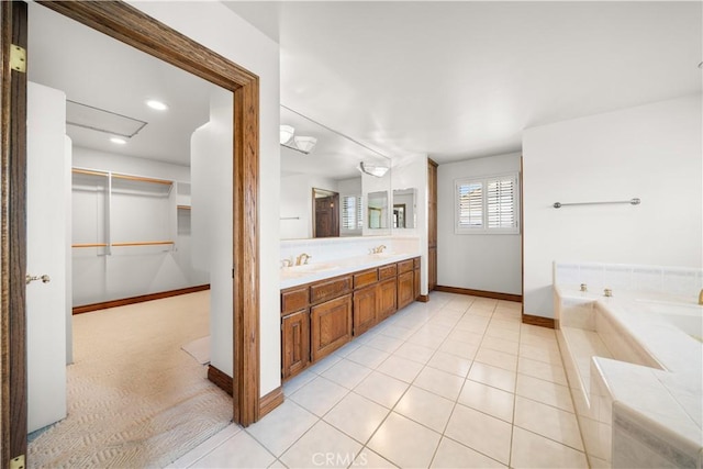 519 Connie Rae Way, Arcadia, CA 91006 - full bathroom featuring baseboards, a bath, double vanity, tile patterned flooring, and a spacious closet