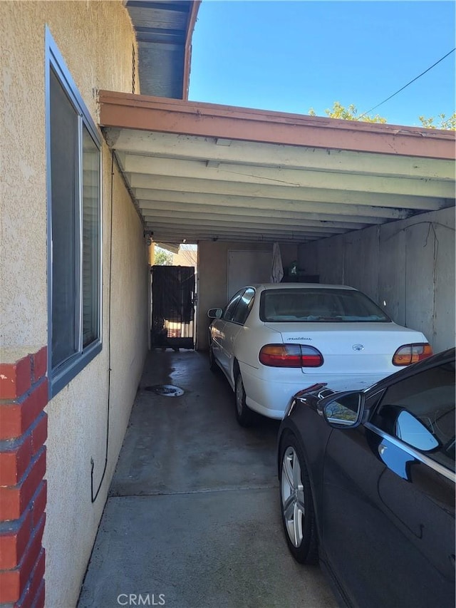view of car parking with an attached carport