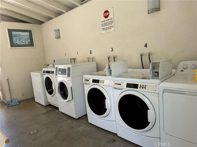 661 Avenida Sevilla Unit O, Laguna Woods, CA 92637 - shared laundry room featuring washing machine and dryer and wood ceiling