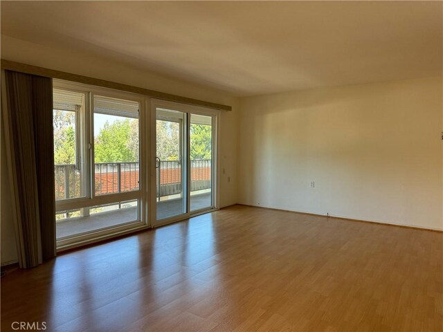 661 Avenida Sevilla Unit O, Laguna Woods, CA 92637 - unfurnished room featuring wood finished floors