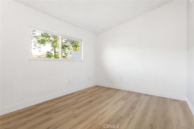 57526 Onaga, Yucca Valley, CA 92284 - unfurnished room featuring light wood-style flooring and baseboards
