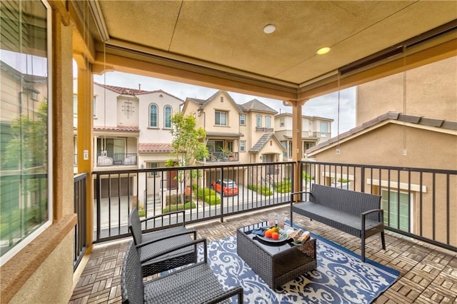 exterior space with a residential view and an outdoor living space