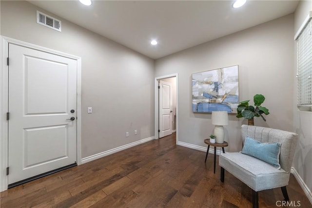 sitting room featuring recessed lighting, wood finished floors, visible vents, and baseboards
