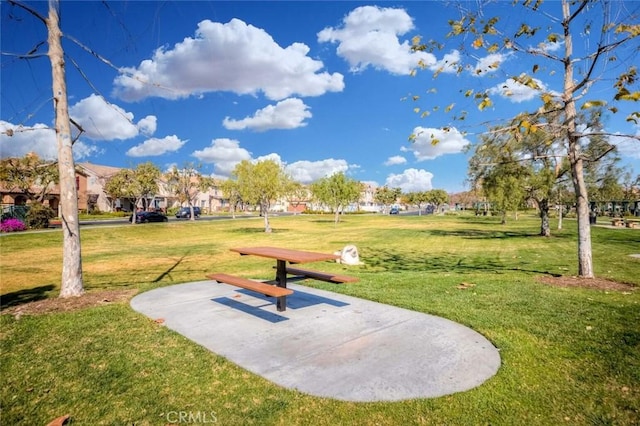 surrounding community with a lawn