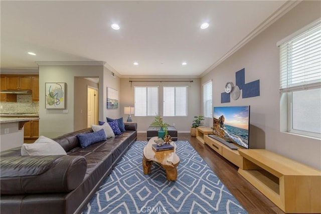 living area with baseboards, recessed lighting, ornamental molding, and dark wood-style flooring