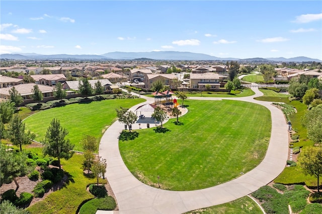 view of home's community featuring a mountain view and a residential view