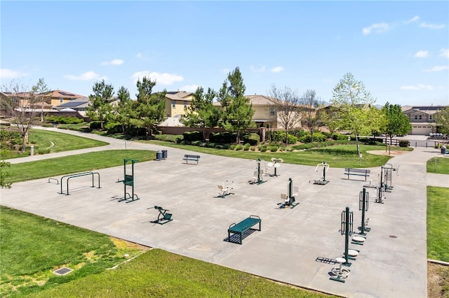 view of community with a yard and a residential view