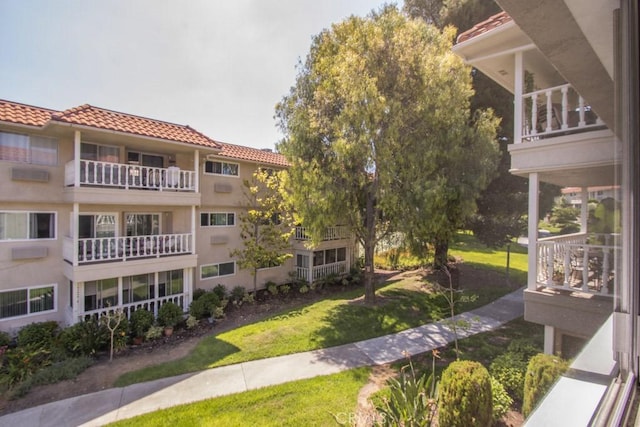 2399 Via Mariposa W Unit 2E, Laguna Woods, CA 92637 - view of community featuring a lawn