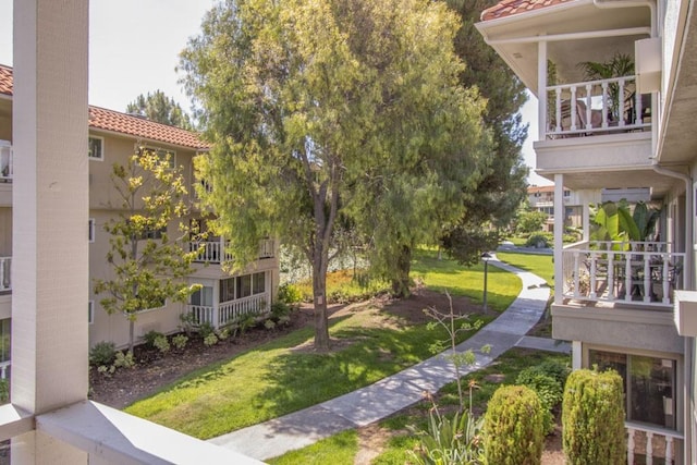2399 Via Mariposa W Unit 2E, Laguna Woods, CA 92637 - view of property's community with a lawn