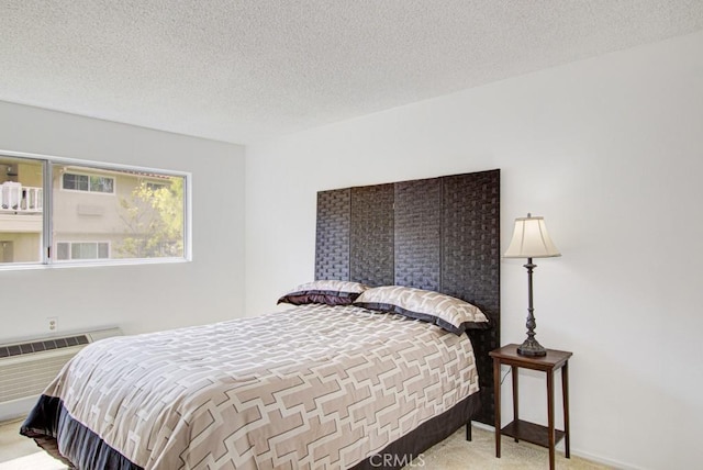 2399 Via Mariposa W Unit 2E, Laguna Woods, CA 92637 - bedroom with carpet floors and a textured ceiling