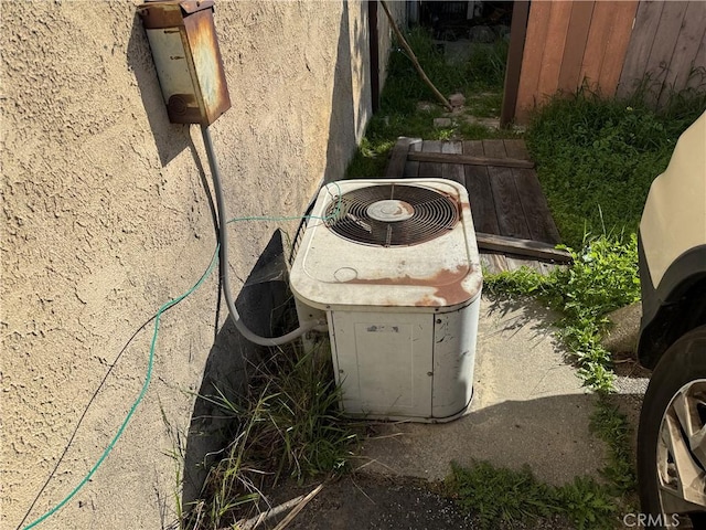 2453 S Ridgewood Dr, West Covina, CA 91792 - exterior view of stucco siding and central air condition unit