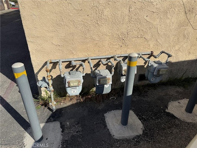 2453 S Ridgewood Dr, West Covina, CA 91792 - exterior view of stucco siding and gas meter