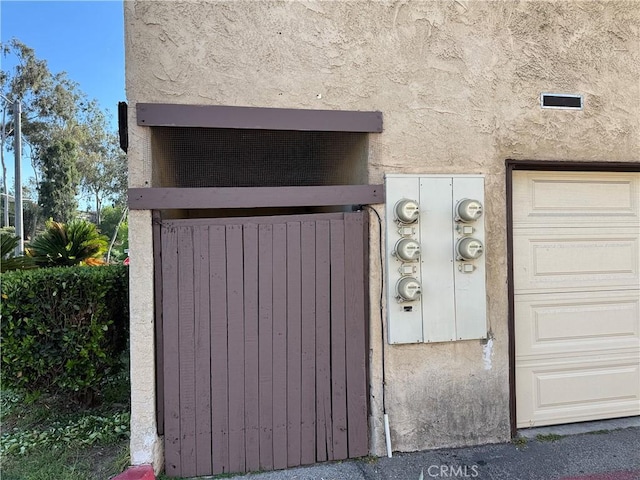 2453 S Ridgewood Dr, West Covina, CA 91792 - exterior view of stucco siding and electric meter