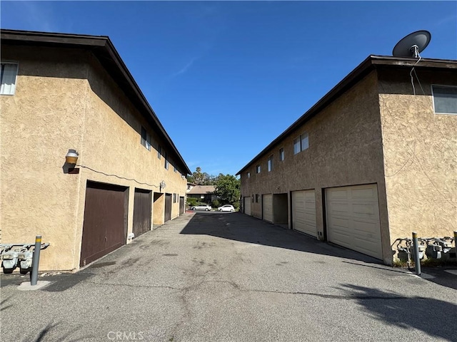 2453 S Ridgewood Dr, West Covina, CA 91792 - view of street featuring community garages