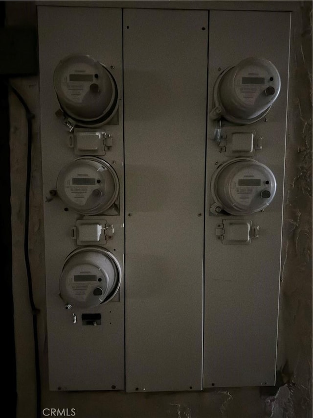 2453 S Ridgewood Dr, West Covina, CA 91792 - laundry area featuring stacked washer / dryer