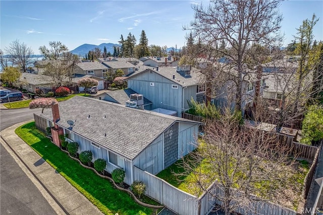 aerial view with a mountain view and a residential view