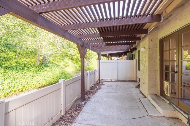 26144 Rainbow Glen Dr, Newhall, CA 91321 - view of patio featuring fence and a pergola