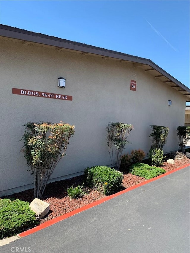 1441 Homewood Rd Unit M5-96B, Seal Beach, CA 90740 - view of property exterior featuring stucco siding