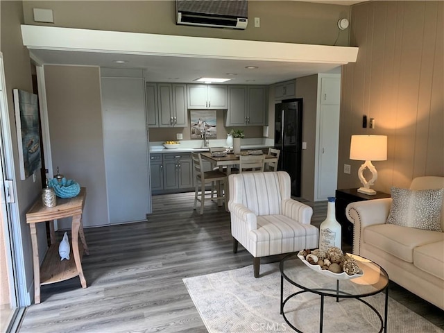 1441 Homewood Rd Unit M5-96B, Seal Beach, CA 90740 - living room featuring light wood finished floors