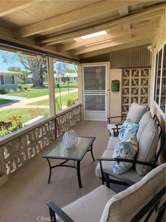 1441 Homewood Rd Unit M5-96B, Seal Beach, CA 90740 - sunroom / solarium with healthy amount of natural light and beam ceiling
