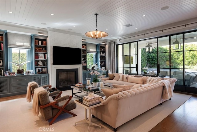 617 Anderson St, Manhattan Beach, CA 90266 - living area featuring recessed lighting, a fireplace, light wood-style flooring, and visible vents