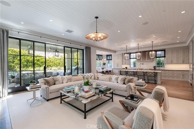 617 Anderson St, Manhattan Beach, CA 90266 - living room with a chandelier, recessed lighting, visible vents, light wood finished floors, and wood ceiling