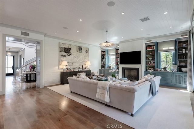 617 Anderson St, Manhattan Beach, CA 90266 - living room with visible vents, recessed lighting, a glass covered fireplace, and wood finished floors