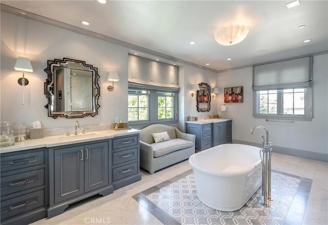 617 Anderson St, Manhattan Beach, CA 90266 - full bath with a sink, two vanities, recessed lighting, and a freestanding tub