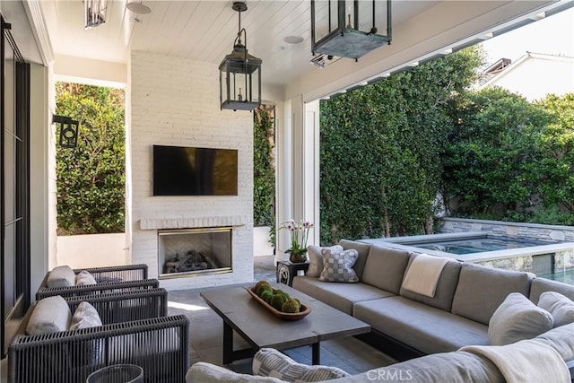 617 Anderson St, Manhattan Beach, CA 90266 - view of patio with an in ground hot tub and an outdoor living space with a fireplace
